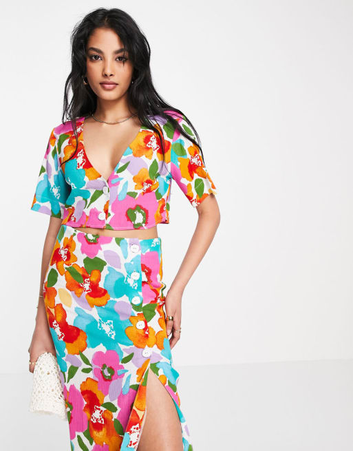 Conjunto con estampado floral luminoso y botones laterales de ASOS DESIGN