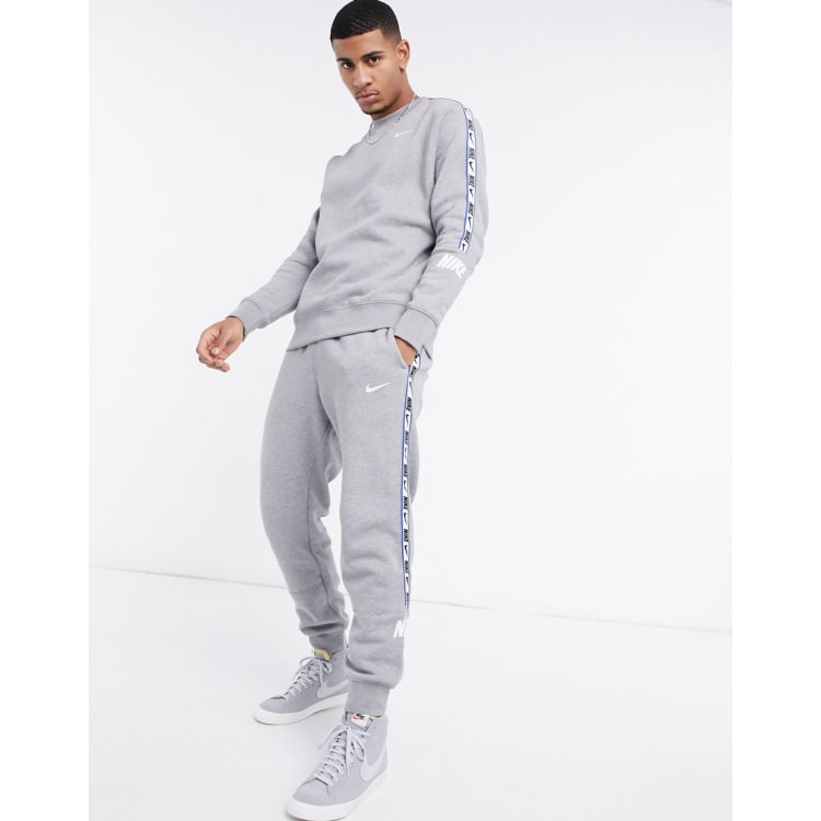 Conjunto de ch ndal gris con cinta con logo Repeat Pack de Nike ASOS