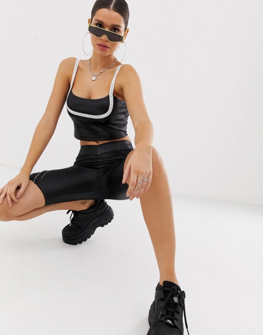 Conjunto de top corto y leggings con detalle de cinta reflectante de Criminal Damage
