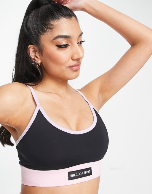 Conjunto deportivo negro con diseño color block Breeze de Pink Soda