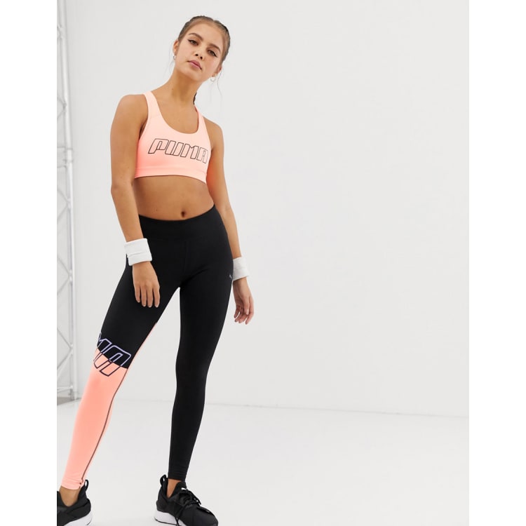 Leggings deportivos con diseño colour block rosa y negro de Puma