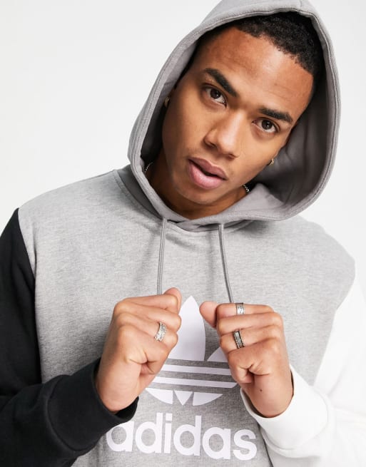 Conjunto negro con diseño color block de adidas Originals