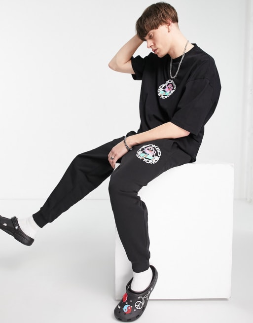 Conjunto negro con estampado gráfico de monopatín CT de Crooked Tongues