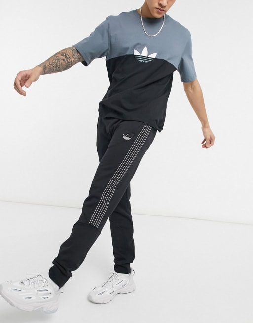 Conjunto negro con tres bandas SPRT de adidas Originals
