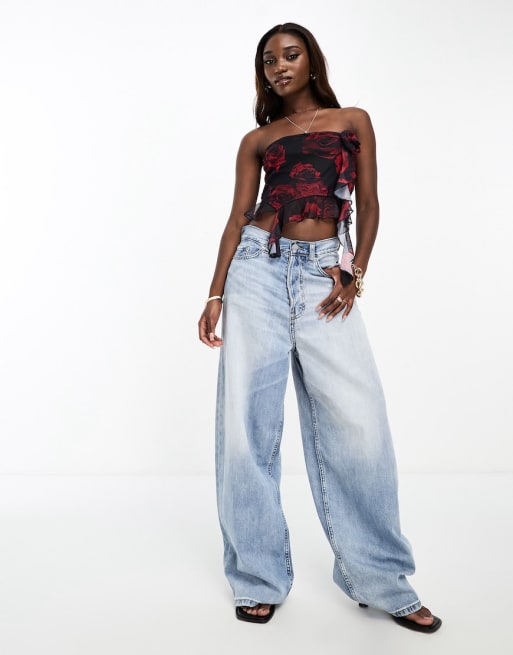 Conjunto negro de top palabra de honor y falda larga con detalle de volantes y estampado floral de malla de NaaNaa