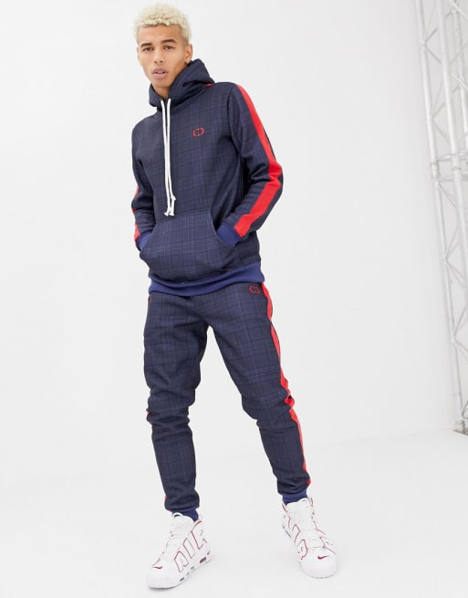 Criminal Damage check tracksuit in navy with side stripe | ASOS