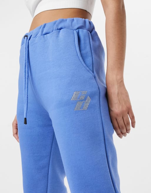 Criminal Damage co-ord with rhinestone embellished logo in blue