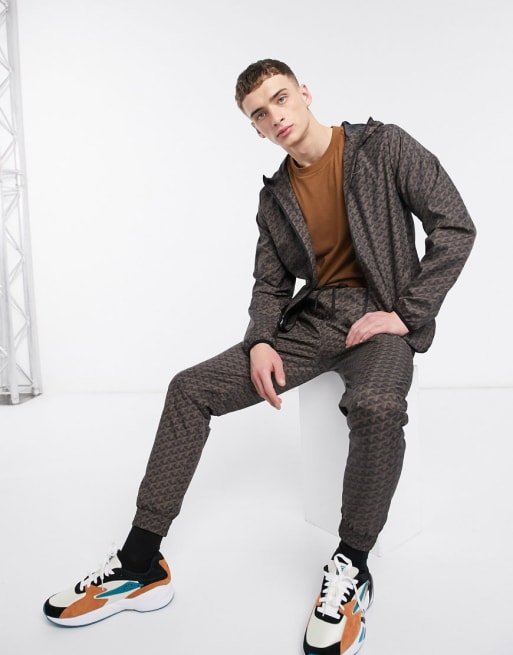 Criminal Damage nylon tracksuit in black pattern | ASOS