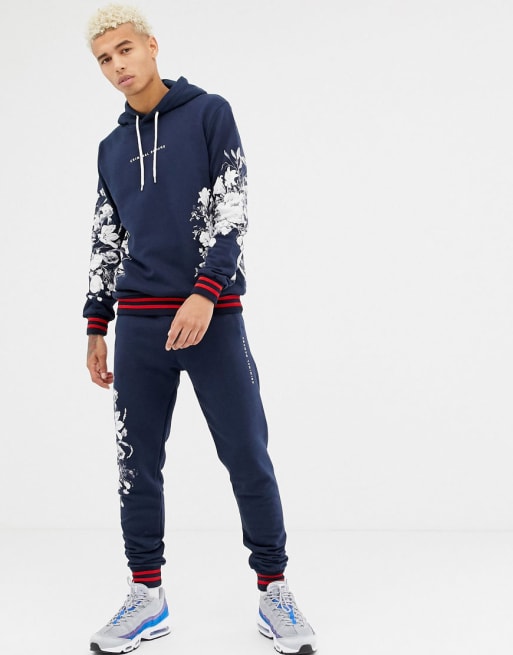 Criminal Damage tracksuit in navy with floral print | ASOS