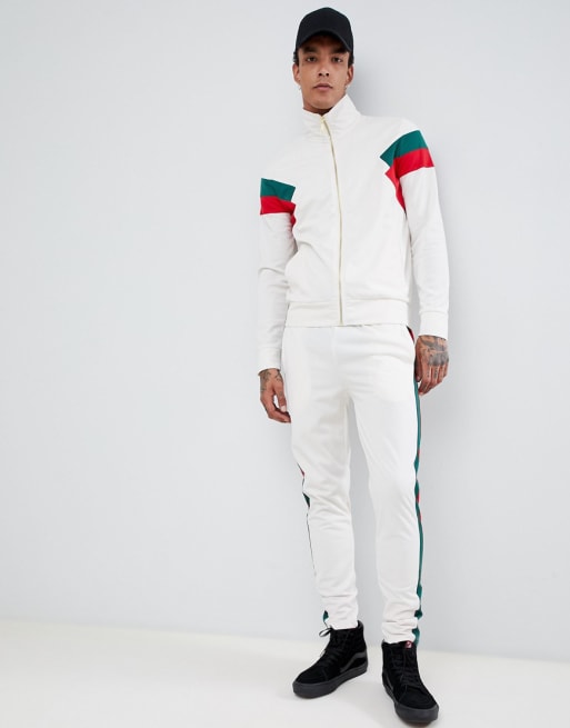 White tracksuit with store red stripes