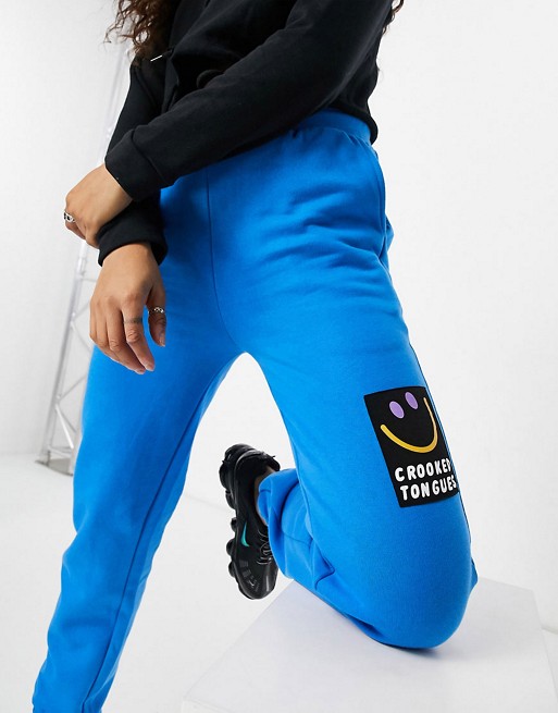 Crooked Tongues co-ord jogger and sweatshirt with badge logo in bright blue