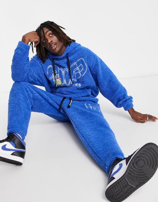 Crooked Tongues - Co-ord set van teddy borg met logo en geborduurd personage in blauw