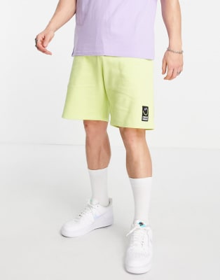 Crooked Tongues co-ord with flower logo and badge in green