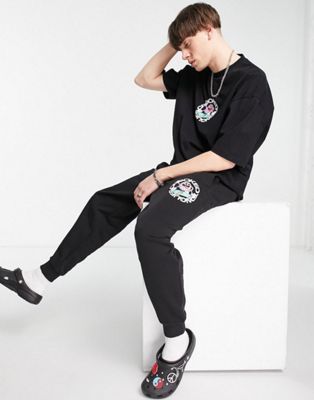 Crooked Tongues co-ord with skateboard CT man graphic print in black