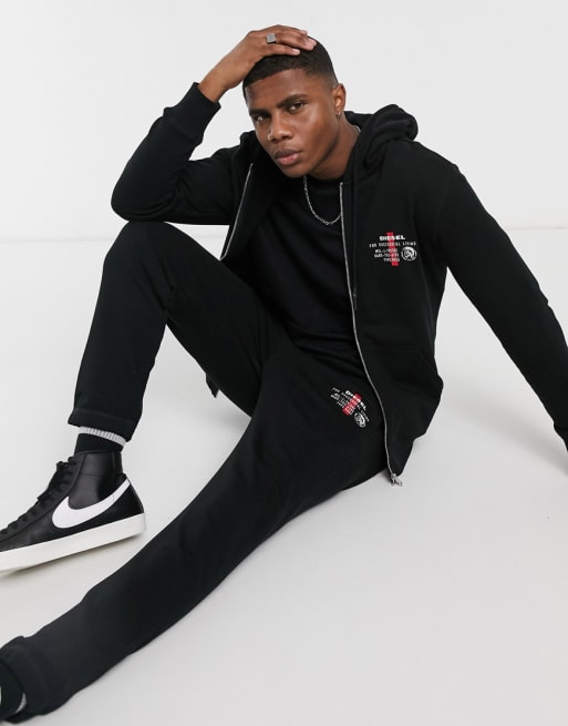 Diesel small logo tracksuit in black | ASOS