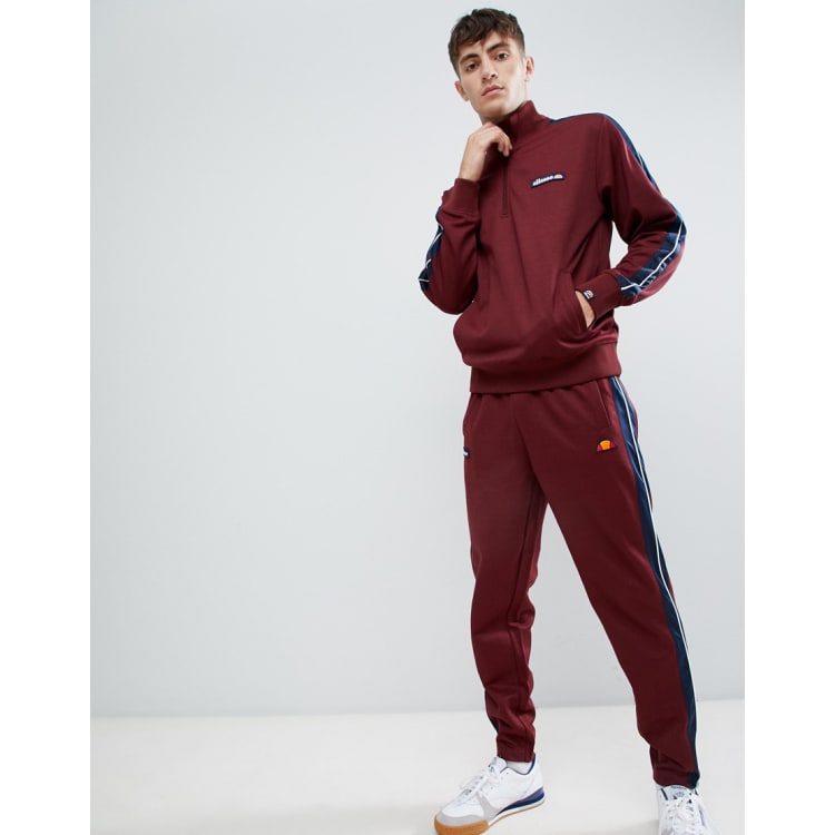 ellesse tracksuit with taping in burgundy ASOS