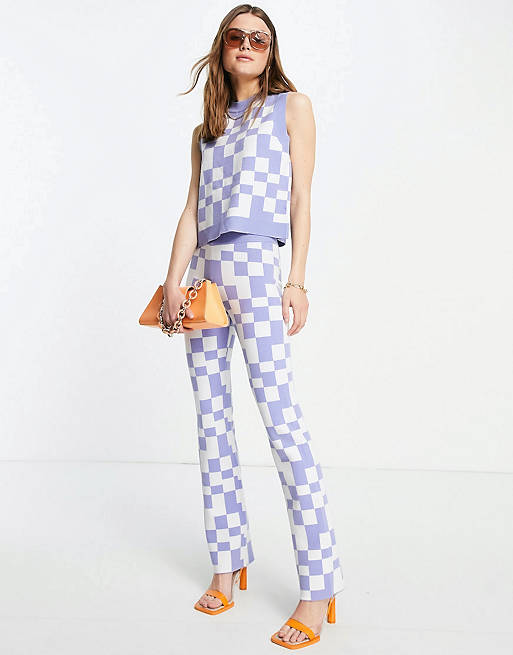 Envii sleeveless singlet and high waisted flares set in blue retro check
