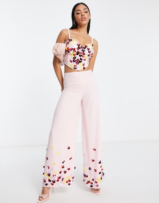 Esclusiva Starlet - Coordinato a fiori vistosi con top a corsetto decorato e pantaloni