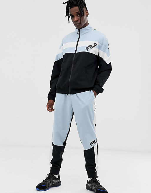 Fila tracksuit with baby blue blocking in black | ASOS