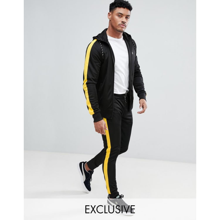 Yellow tracksuit with store black stripe