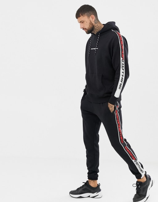 Good For Nothing tracksuit with side stripe in black