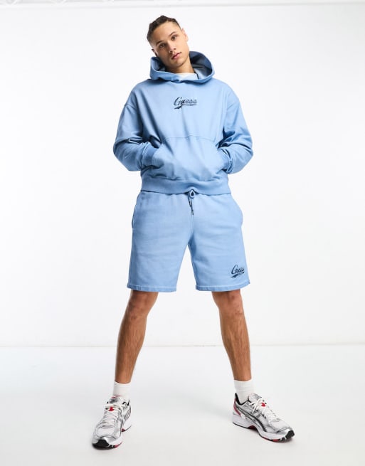 Guess Originals co-ord icon logo hoodie and shorts set in blue | ASOS