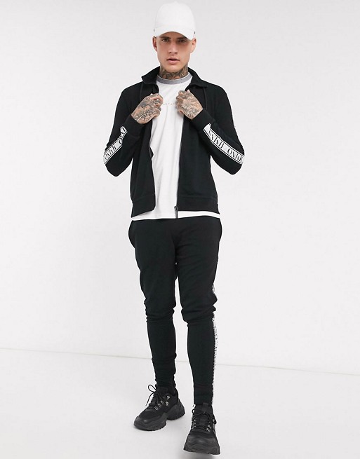 Hermano tracksuit with taping in black