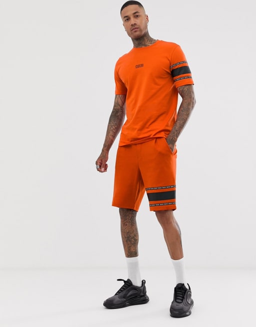 HUGO - T-shirt met tape-detail en short in oranje, combi-set