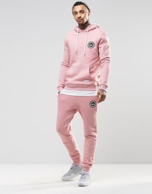 pink joggers and hoodie