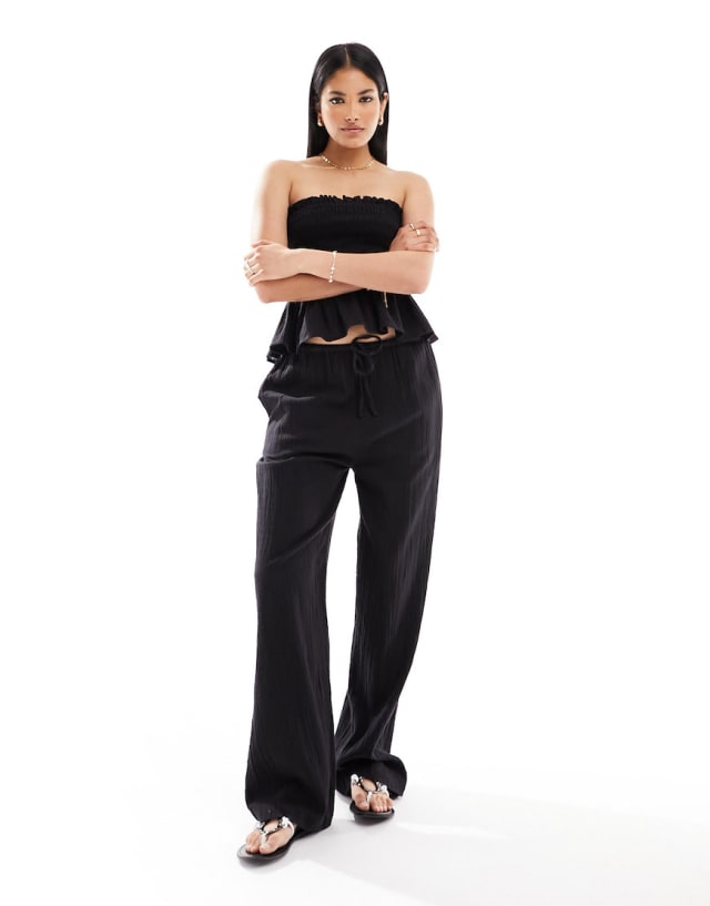 Iisla & Bird - beach top and trouser co-ord in black