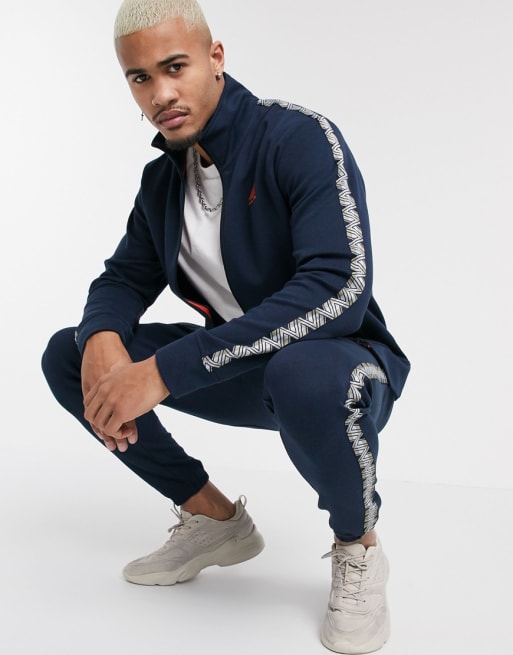 Jack & Jones Originals side taped tracksuit in navy | ASOS