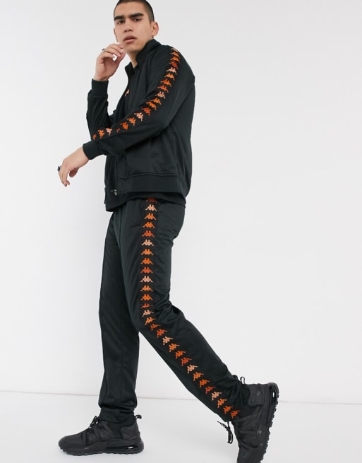 Kappa tracksuit with orange taping on black | ASOS