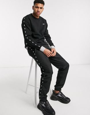 all black lacoste tracksuit