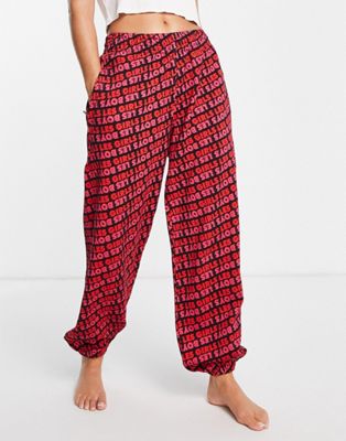 Les Girls Les Boys all over logo loose fit joggers in raspberry