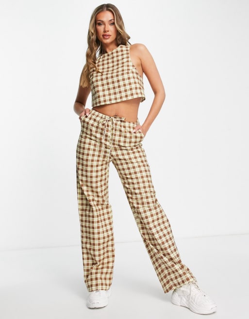 Motel high neck cross back crop top and low rise relaxed pants with drawstring