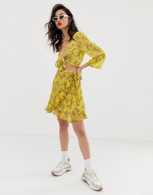 Na-kd floral print crop top & skirt in yellow | ASOS