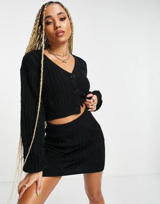 NA-KD X Anna Briand co-ord cropped cable knit cardigan in black