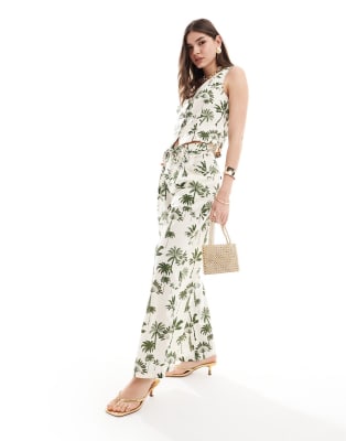Never Fully Dressed waistcoat and maxi skirt co ord in green palm print