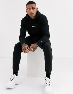 New Era Essentials sweatsuit in black | ASOS