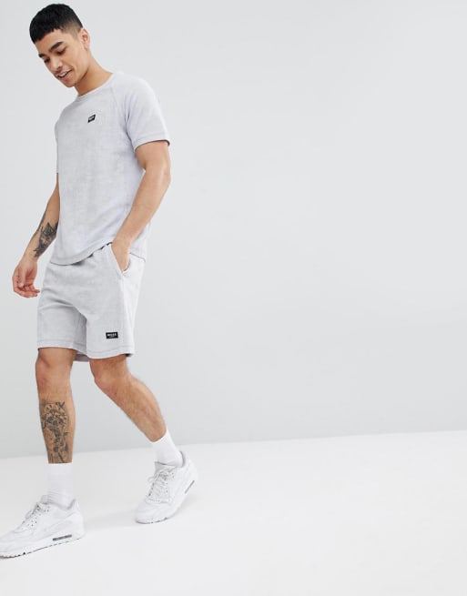 Nicce - Ensemble avec t-shirt et short en tissu éponge 