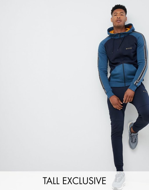  Nicce Tall - Bronco - Tuta blu con righe laterali