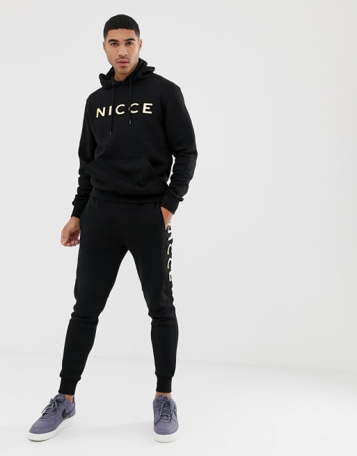 Nicce tracksuit in black with gold logo ASOS