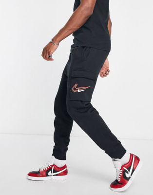 Nike tracksuit with ticks down cheap the side