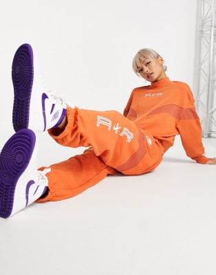 Green and outlet orange nike tracksuit