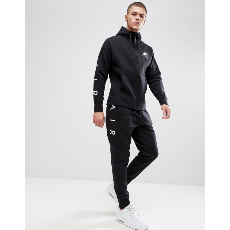 Plain black hotsell nike tracksuit