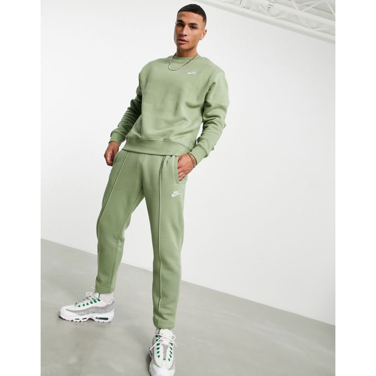 Green and orange nike 2024 tracksuit