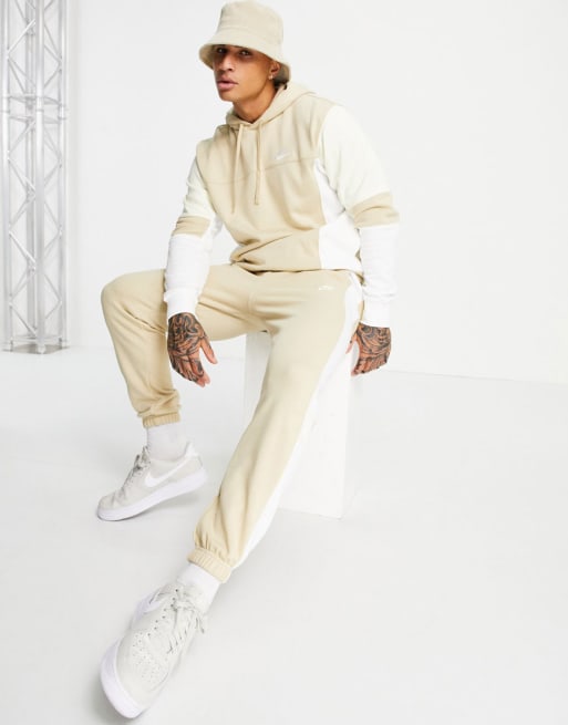 Nike Colourblock tracksuit in white and sand