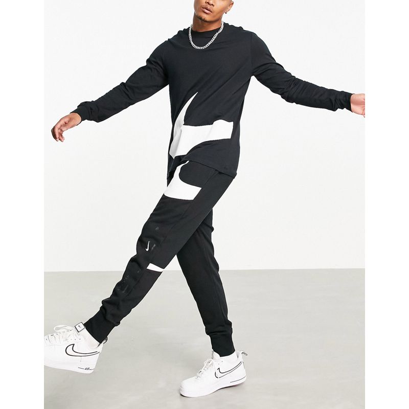 NUxOq Uomo Nike - Completo nero con logo bianco