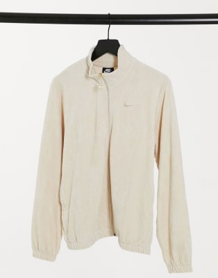 beige nike tracksuit