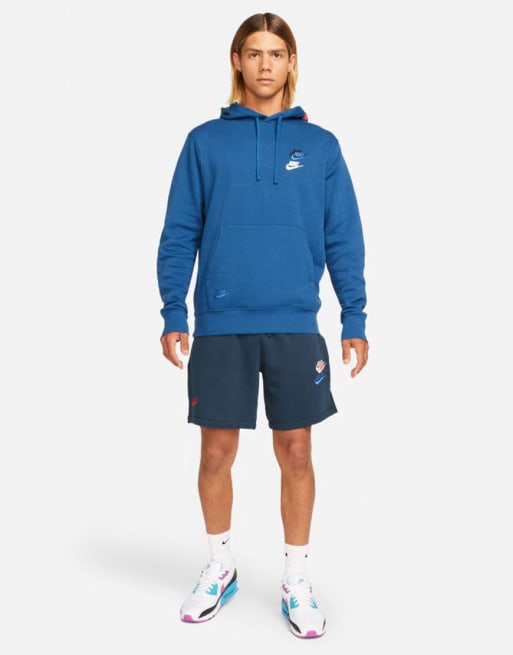 Nike Essential fleece multi logo tracksuit in blue